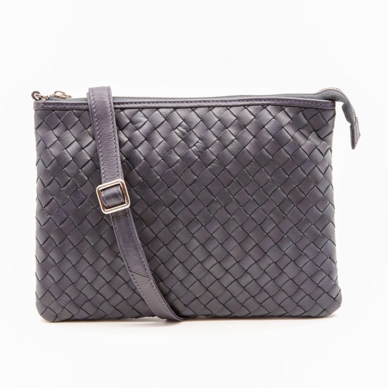 Lappella Yasmin luxury soft leather crossbody/ clutch bag in navy weave. Strap across front.