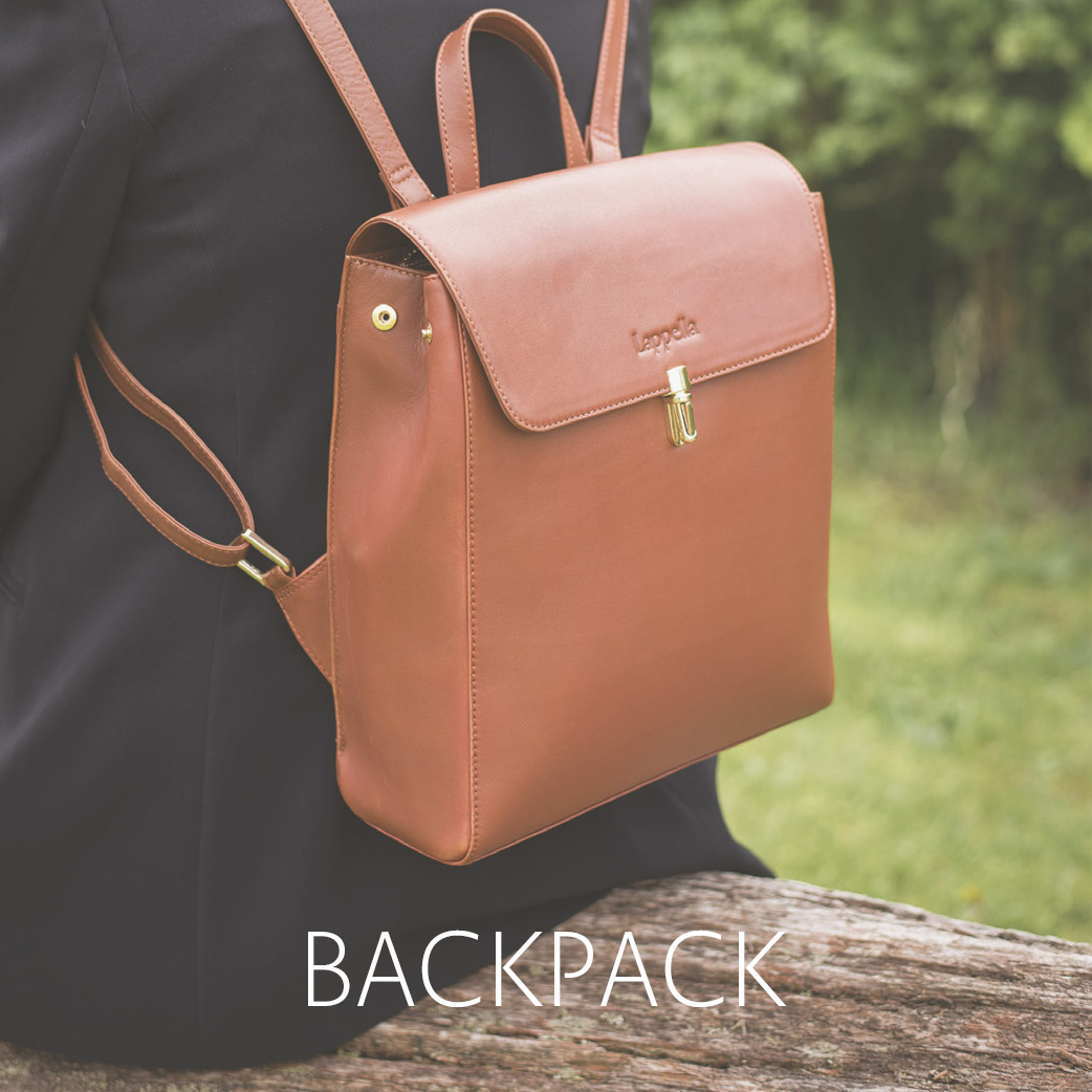 Emma backpack in luxury soft tan leather. Lifestyle shot