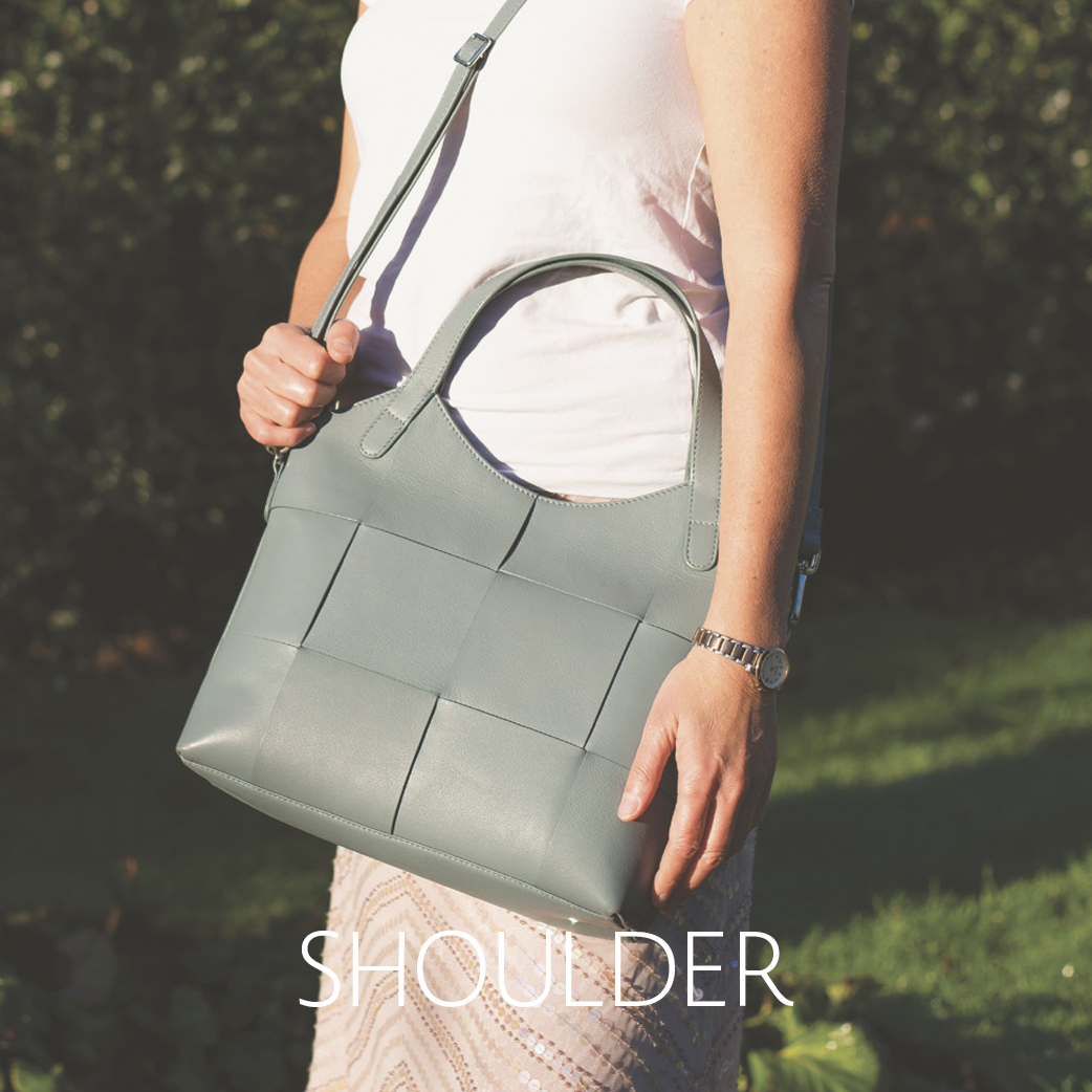 Isabella shopper bag in luxury soft Morning blue leather. Lifestyle shot